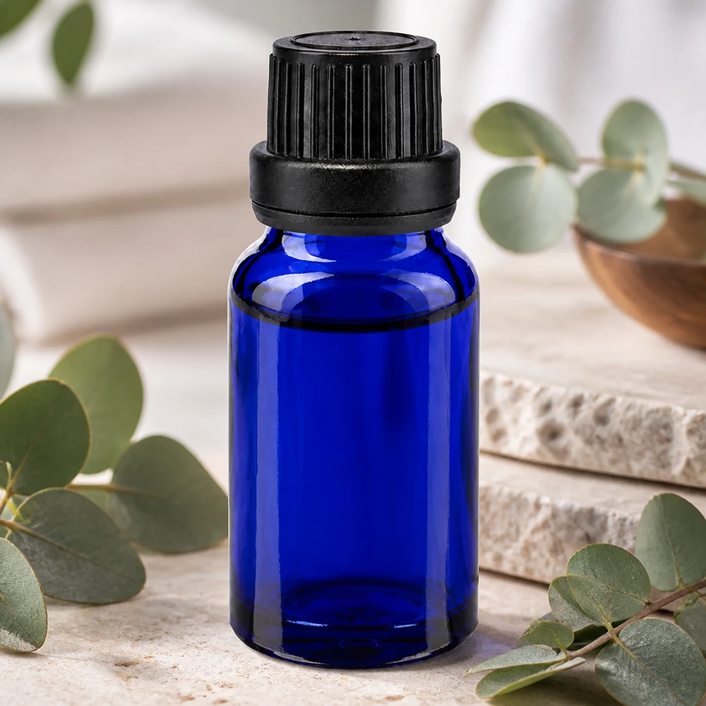 Koboltblå 10 ml glasflaske med sort skruelåg og sikkerhedsring til naturkosmetik