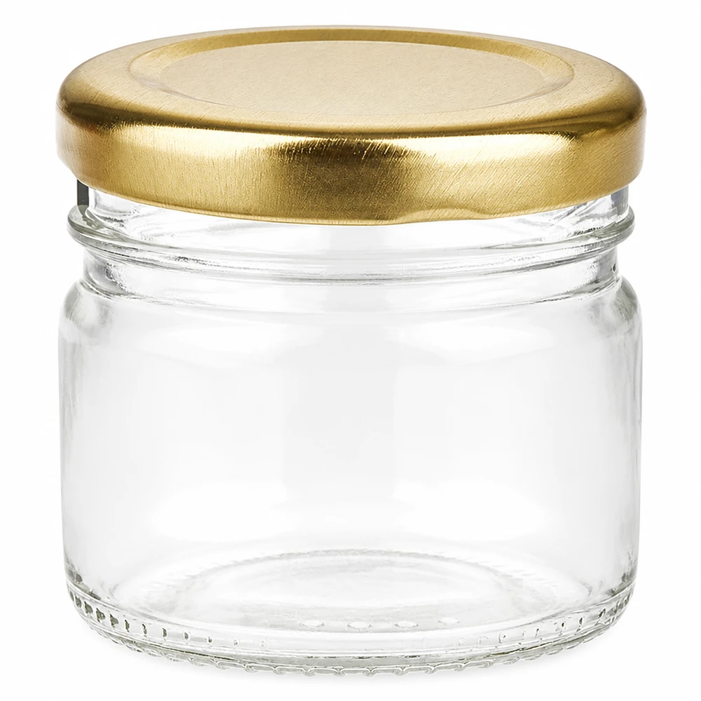 Lille rund glasbeholder på 33 ml med gyldent BasicSeal-skruelåg af klart glas til marmelade og honning