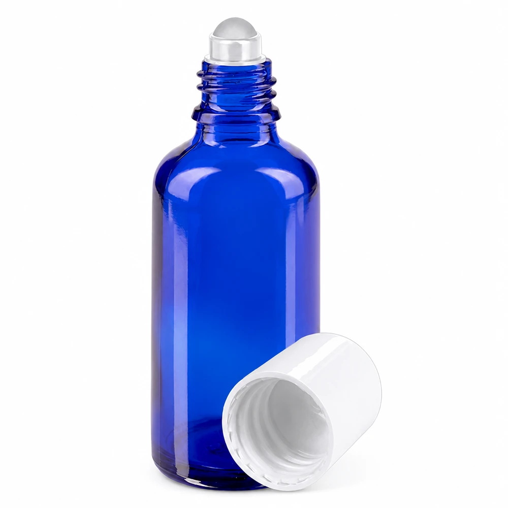 Apoteksflaske blå 50 ml roll-on-hætte hvid 50 ml blå roll-on-flaske af apoteksglas med hvidt låg og applikator med rullekugle