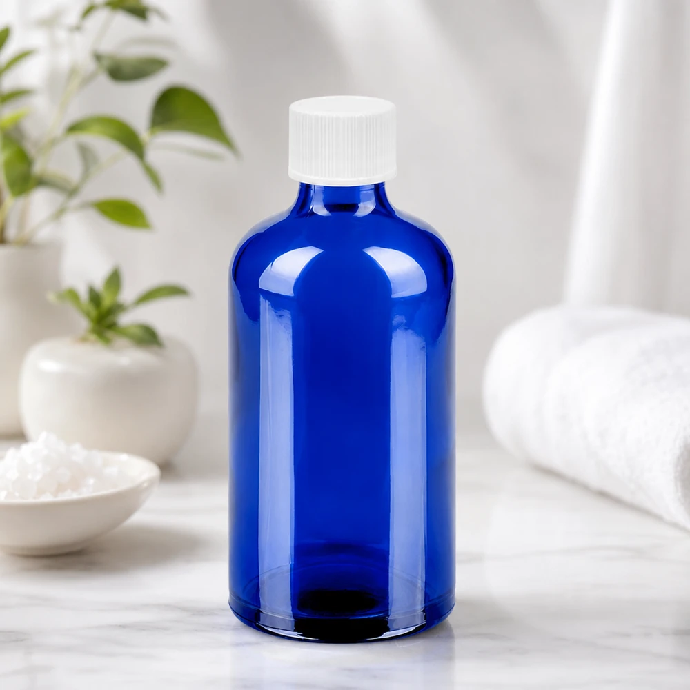 100 ml flaske 11 mm SV hvid STD BlueLine UT18/100 Kompakt 100 ml glasflaske i lyseblå med hvid 11 mm hætte til hverdagsbrug