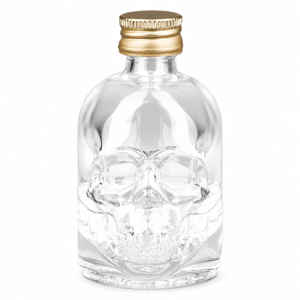 50 ml glasflaske »Hector« og skruelåg guld UNiTWIST® 50 ml Hector-glasflaske med dødningehoveddesign og UNiTWIST-skruelåg i guld til spiritus og drinks