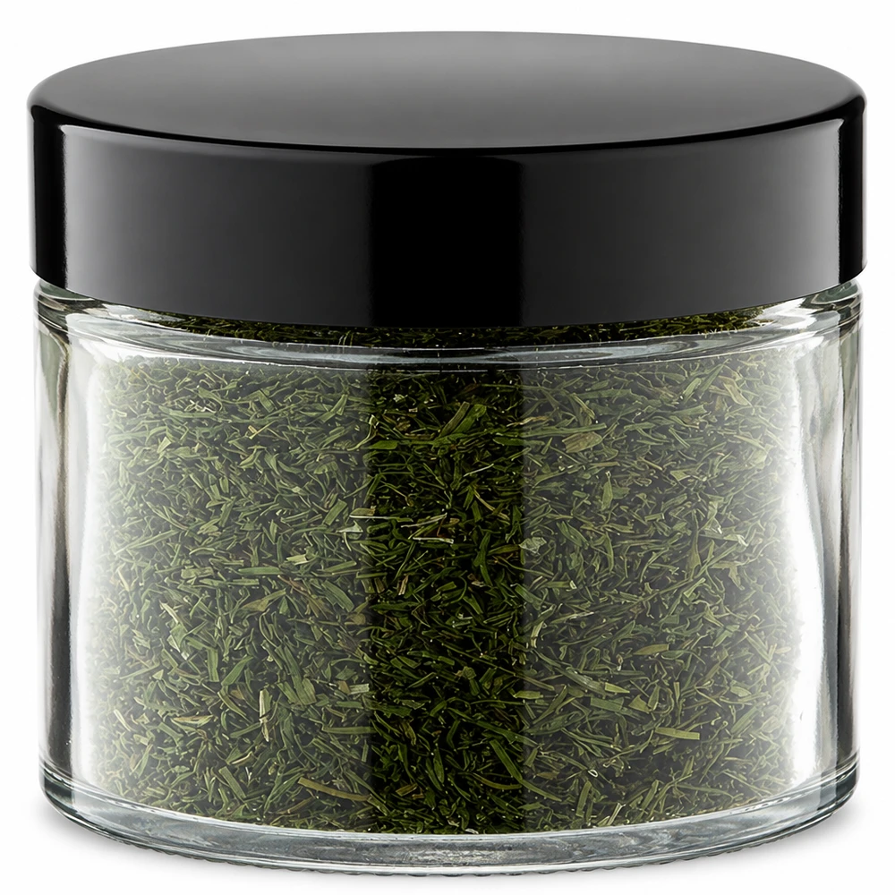 Glasbeholder på 30 ml, gennemsigtig med sort skruelåg, fyldt med tørrede urter