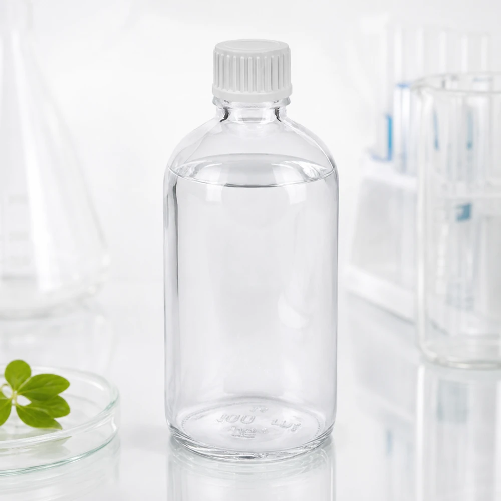 100 ml dråbeflaske 0,9 mm hvid STD ClearLine UT18/100 100 ml ClearLine-dråbeflaske UT18 med 0,9 mm åbning i et sterilt laboratoriemiljø med petriskål