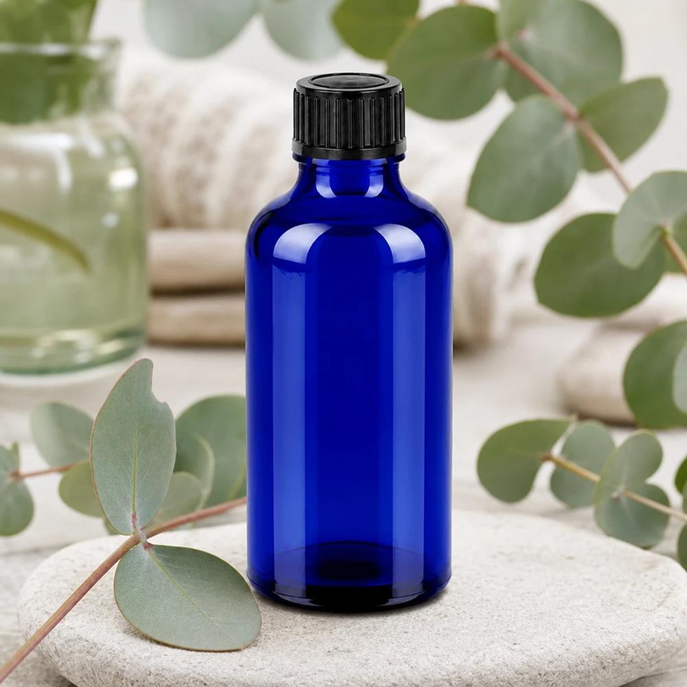 Elegant koboltblå 50 ml glasflaske med matsort skruelåg til professionel brug