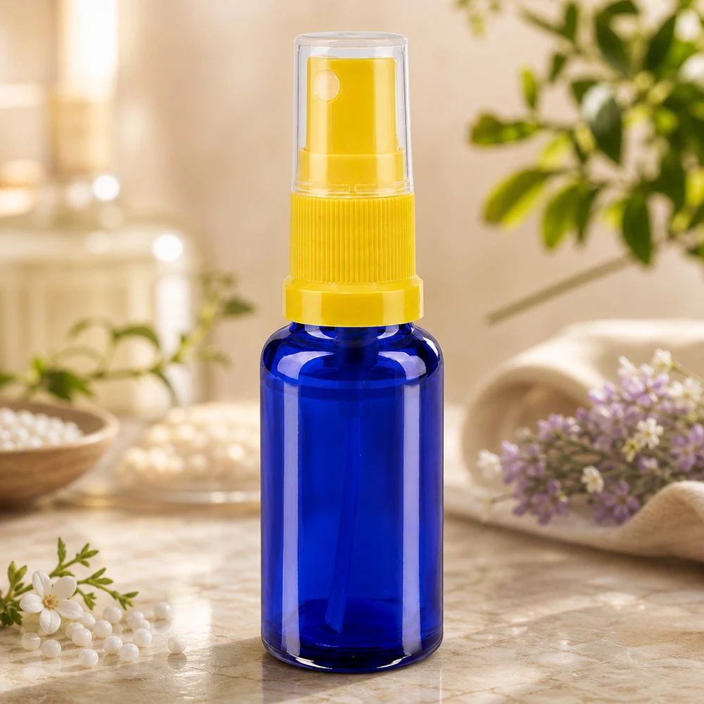 Apotekerflaske blå 20 ml spraytilbehør gul Kompakt sprøjteflaske på 20 ml af UV-beskyttet blåt glas med gul pumpehoved til apoteker