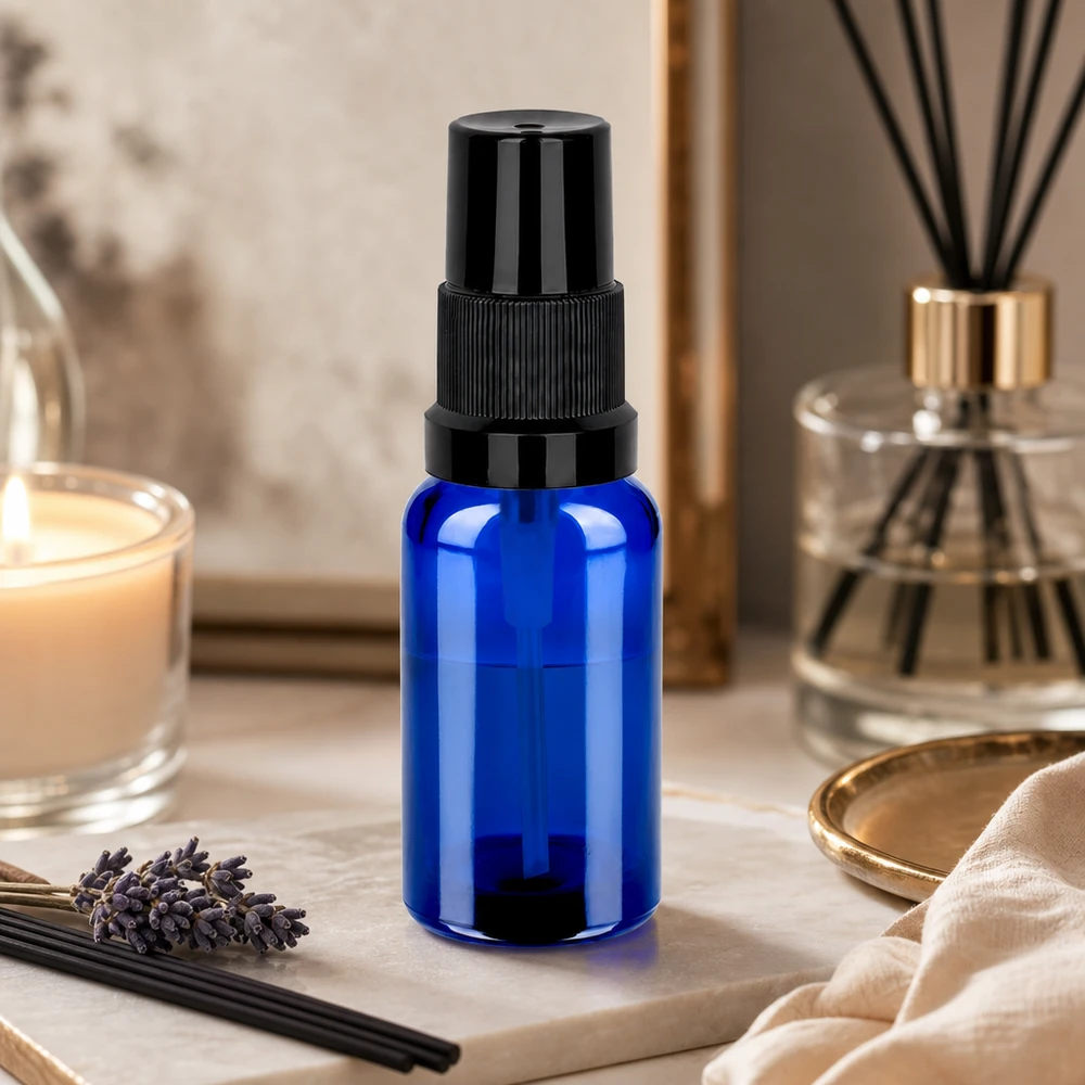 Blå glasflaske i høj kvalitet, 20 ml, med sort sprayhætte til aromaterapi