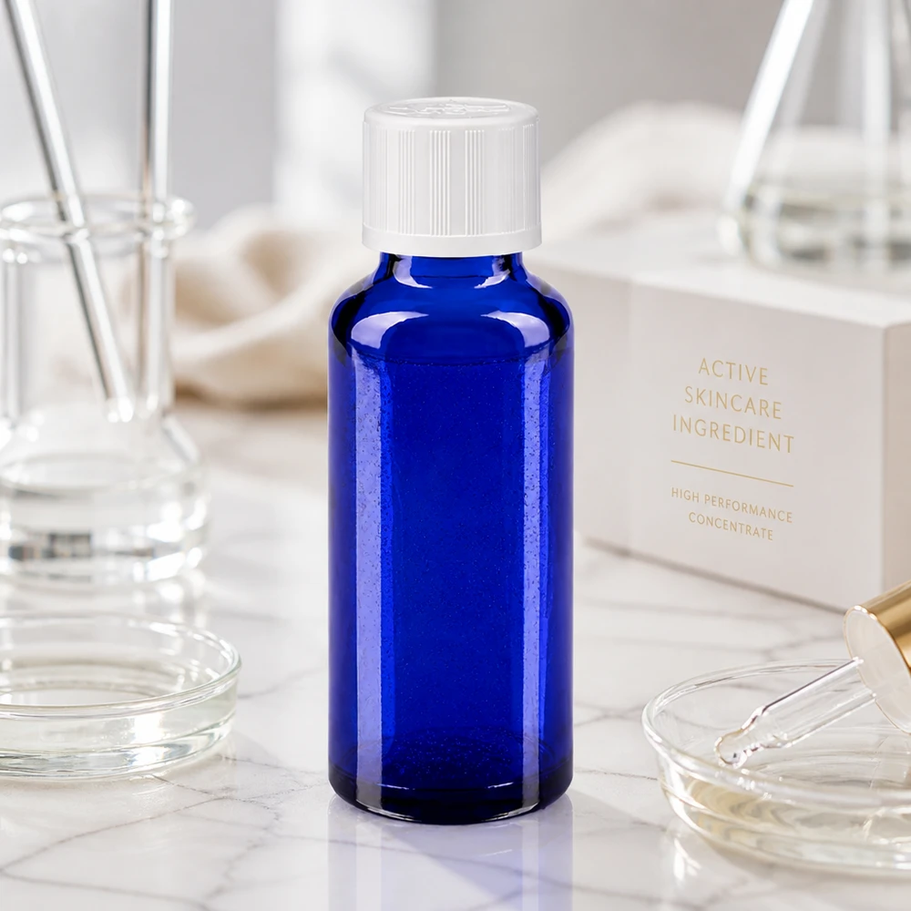 30 ml apotekerglasflaske i koboltblå med hvid børnesikret lukning i laboratorie-stil