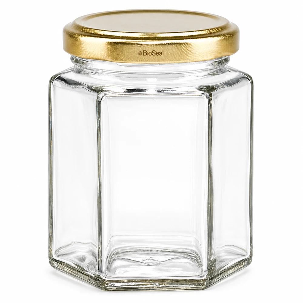 UNiTWIST Hexa196 med gyldent låg TO58 BioSeal Sekskantet murerbalje UNiTWIST Hexa196 med gyldent TO58 BioSeal-låg lavet af gennemsigtigt glas tom