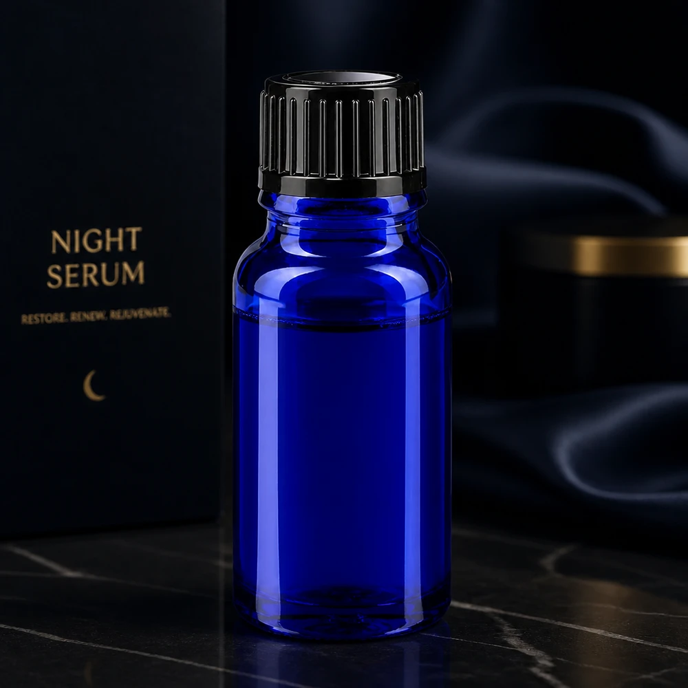 Apoteksflaske blå 10ml skruelåg sort pc Elegant koboltblå 10 ml apotekerflaske med sort skruelåg til brug som natteserum