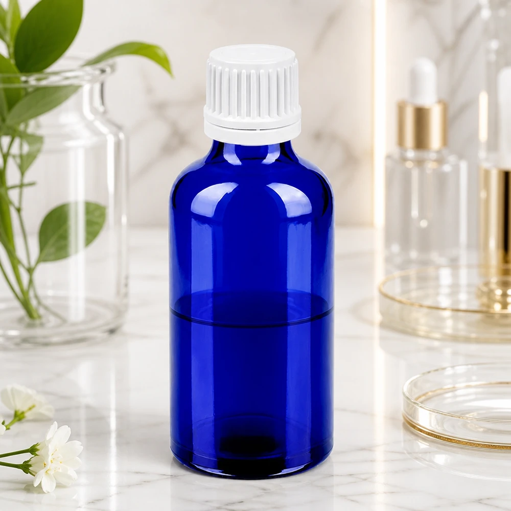 50 ml flaske 11 mm SV hvid OV BlueLine UT18/50 Rund 50 ml glasflaske i lyseblå med praktisk hvid dråbehætte