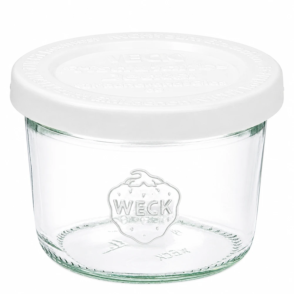 80 ml krukke med friskhedslåg WECK RR60 80 ml WECK-bægre med hvidt friskhedslåg RR60 af klart glas med WECK-logo til konservering og opbevaring