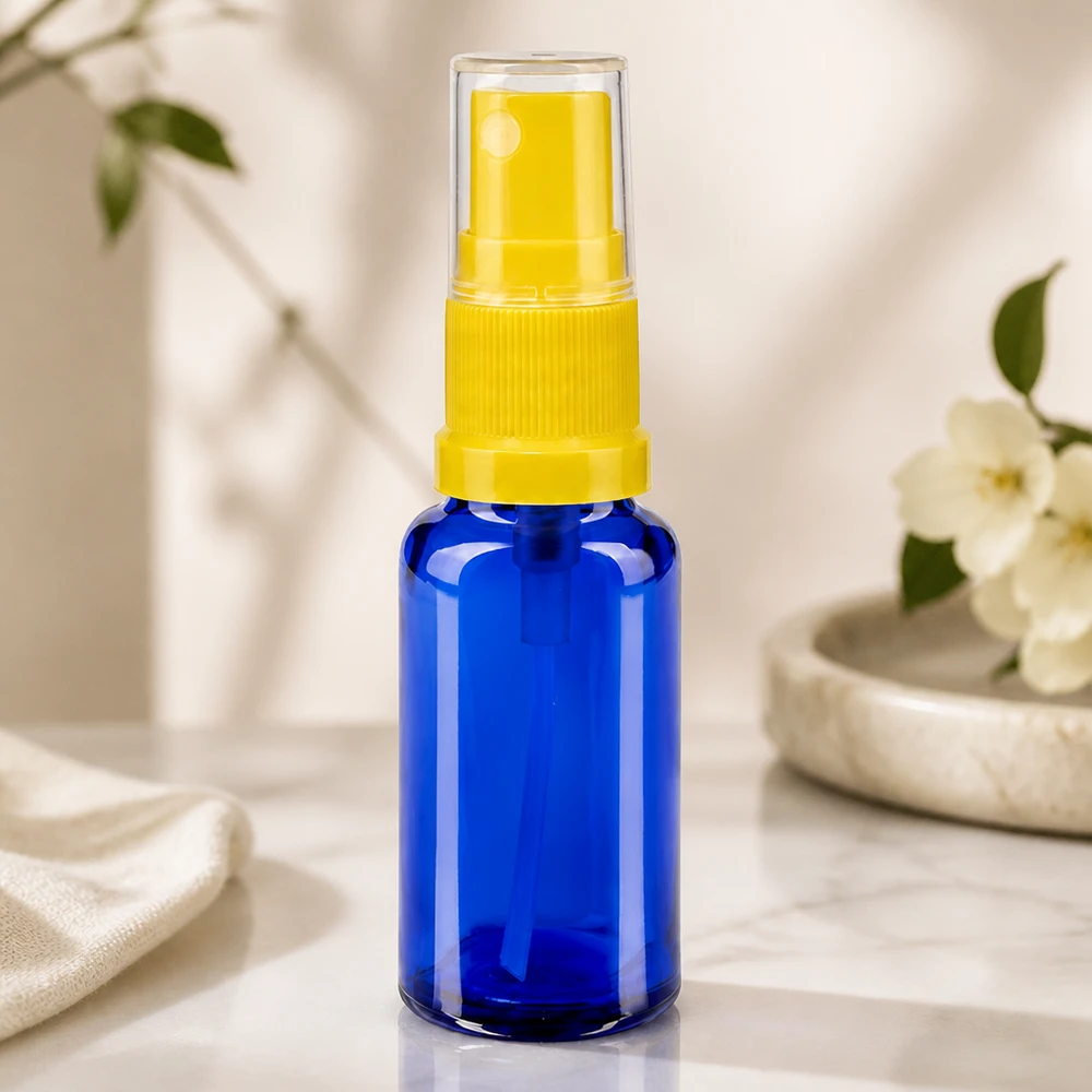 Apotekerflaske blå 20 ml spraytilbehør gul Kompakt apotekersprøjteflaske, 20 ml, blåt glas med gul pumpehoved og gennemsigtig hætte