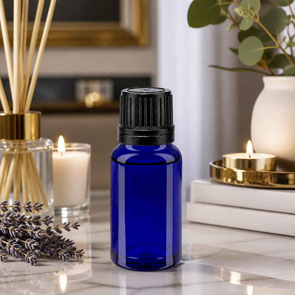 Apoteksflaske blå 10ml skruelåg sort hældeprop r. OV 10 ml koboltblå glasflaske med sort originalprop til æteriske olier og aromaterapi