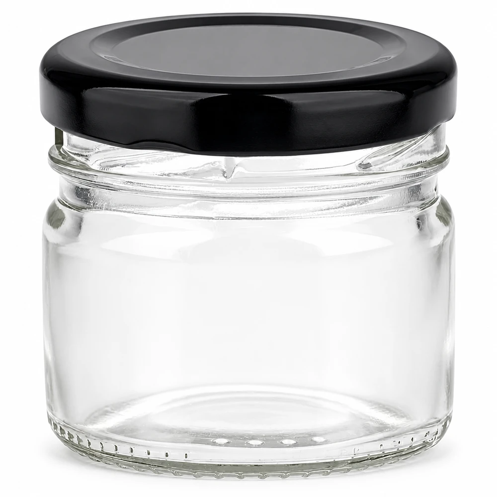 33 ml rundt glas med sort BasicSeal-låg, tomt og gennemsigtigt på hvid baggrund