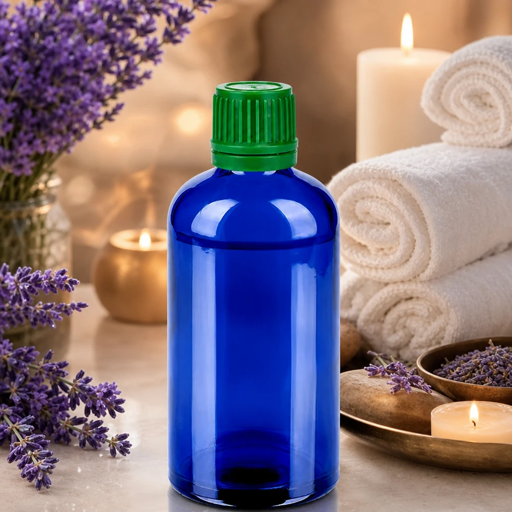 Koboltblå apotekerflaske 100 ml med grønt låg, ideel til aromaterapi og wellness