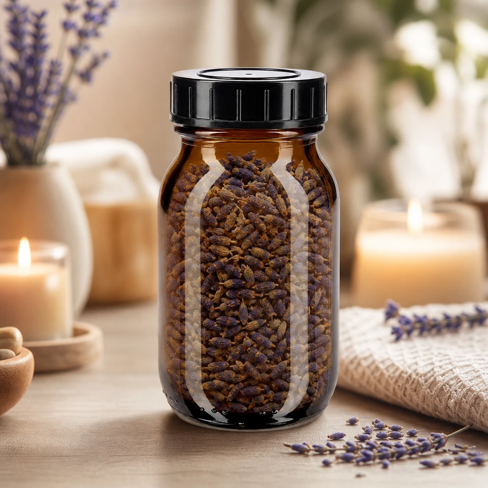 100 ml flaske med bred hals i ravfarvet glas med skruelåg Flaske med bred hals 100 ml i ravfarvet glas med sort hætte til aromasikker opbevaring