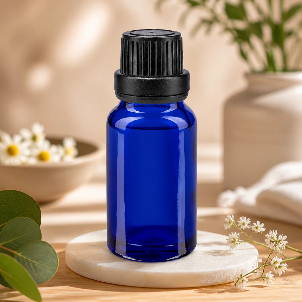 Apotekerglas 10 ml, blåt, med sort originalitetslås og præcisionsdråbetæller 2 mm til aromaterapi