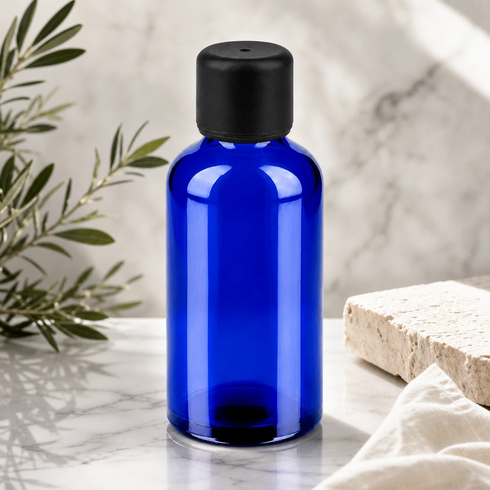 Blå glasflaske i høj kvalitet på 50 ml med mat sort hætte til professionelle kosmetikprodukter