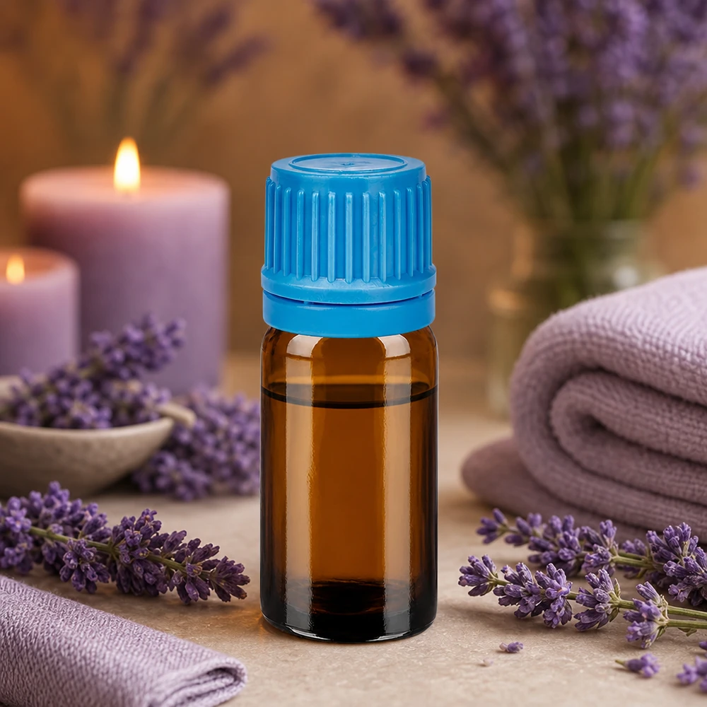 5 ml ravfarvet glasflaske af høj kvalitet med riflet blå hætte til aromaterapi og wellness