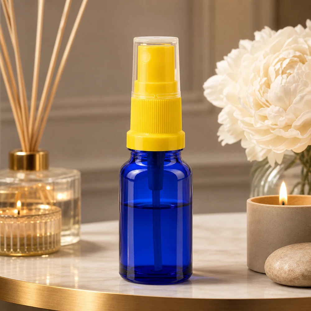 10 ml sprayflaske gul/tr. STD BlueLine UT18/10 Blå 10 ml glassprayflaske med gult sprayhoved til kosmetik og parfume BlueLine UT18 10