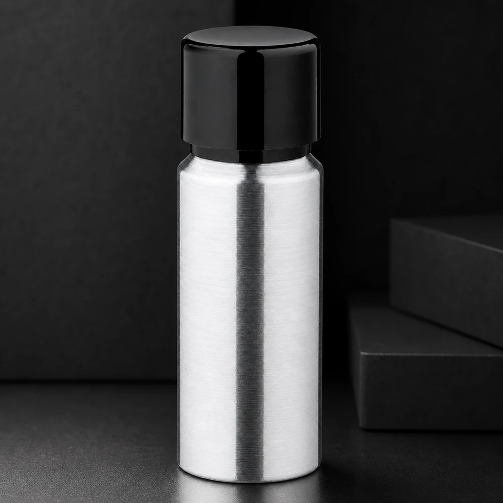 20 ml flaske i poleret aluminium med skruelåg Cylindrisk 20 ml aluminiumsflaske med poleret overflade og sort skruelåg til flydende produkter