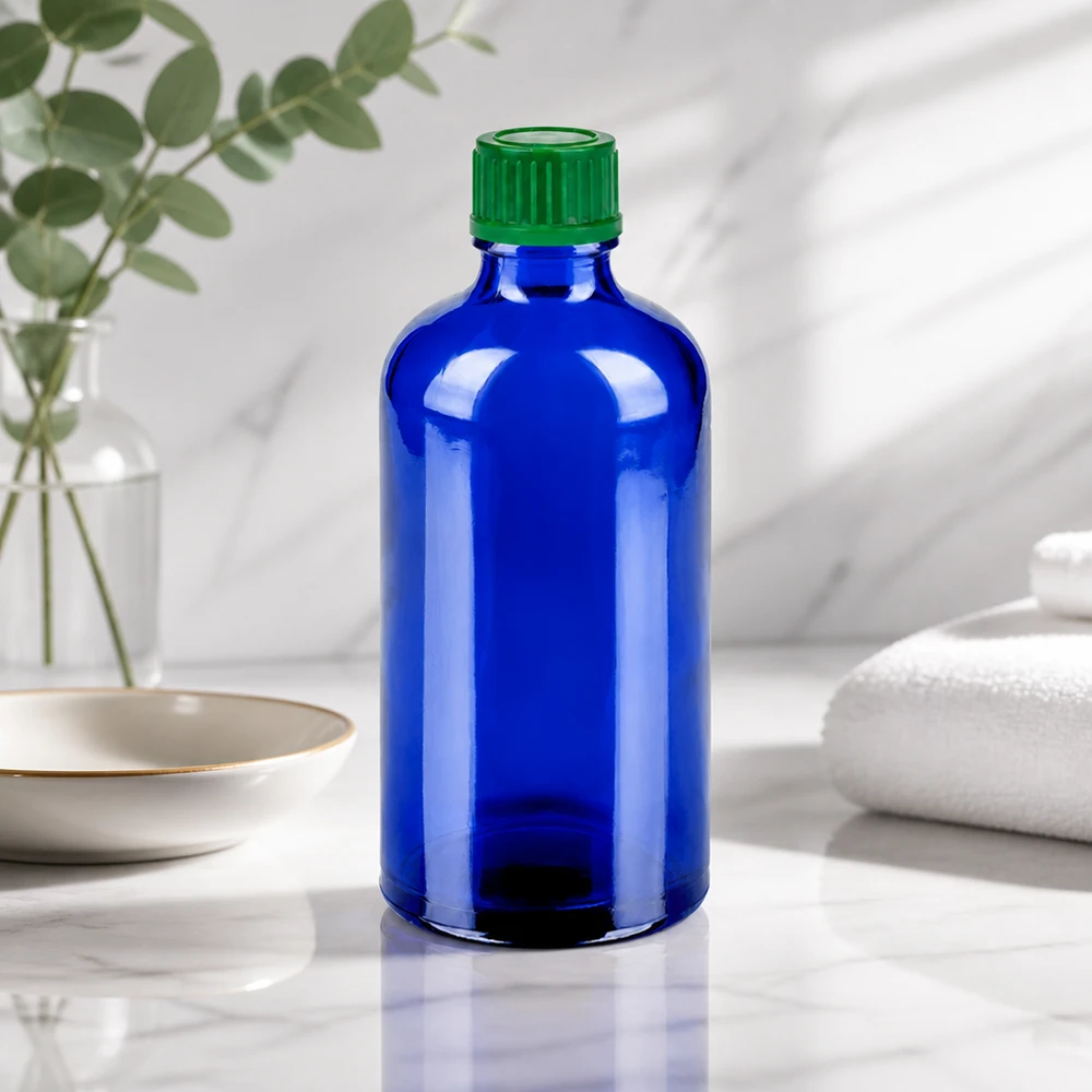 100 ml flaske 11 mm SV grøn STD BlueLine UT18/100 Lille 100 ml glasflaske i elegant blå med praktisk skruelåg til at have med på farten