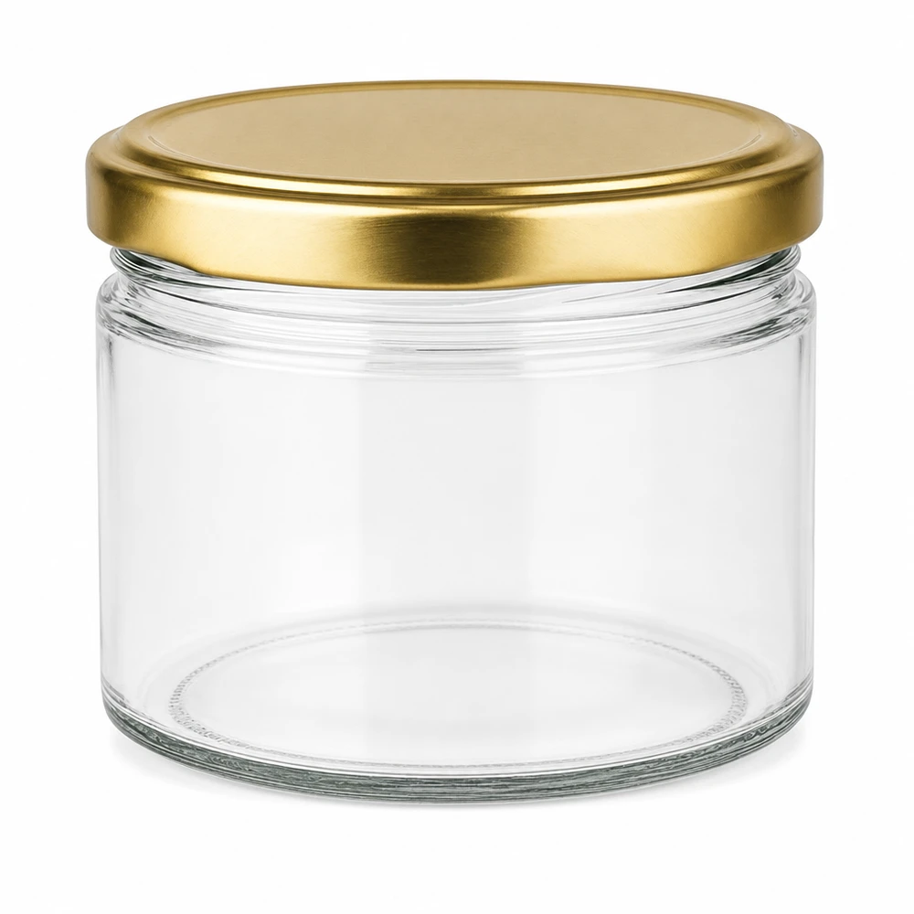 540 ml rund krukke med BasicSeal-låg i guld UNiTWIST 540 ml rund glaskrukke tom med guld BasicSeal UNiTWIST-låg på hvid baggrund
