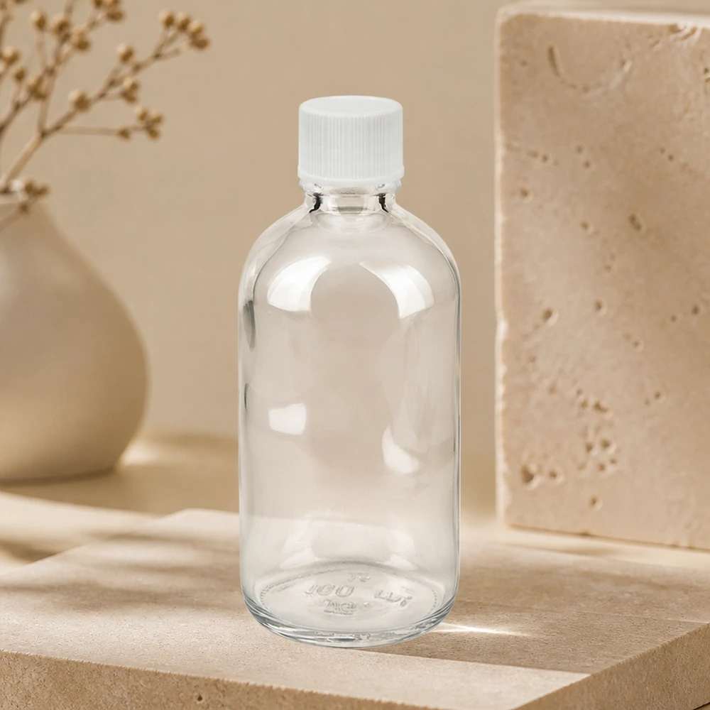 100 ml flaske 11 mm SV hvid STD ClearLine UT18/100 Tom 100 ml apotekerflaske i klart glas med hvid skruelåg – STD ClearLine farmaceutisk emballage