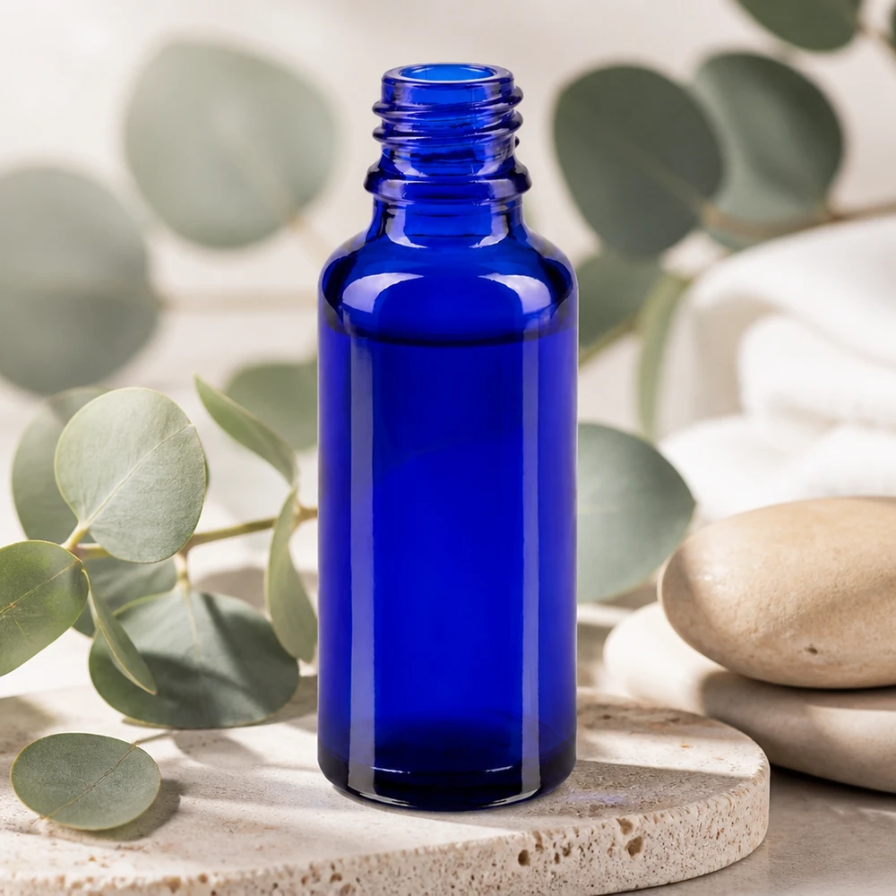 ApoGlas 30 ml apoteksflaske i koboltblå med UV-beskyttelse til æteriske olier og tinkturer
