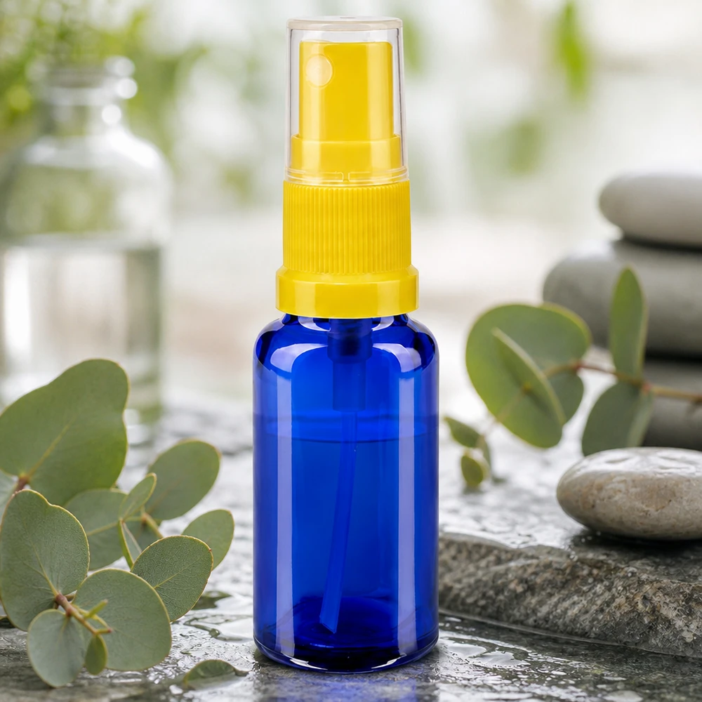 Apotekerflaske blå 20 ml spraytilbehør gul Kompakt sprayflaske på 20 ml af blåt sikkerhedsglas med gul pumpespray til apoteker