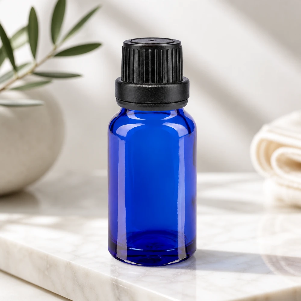 10 ml apotekerglas-dråbeflaske i blå med børnesikret OV-lukning og præcis 2 mm dråbeindsats