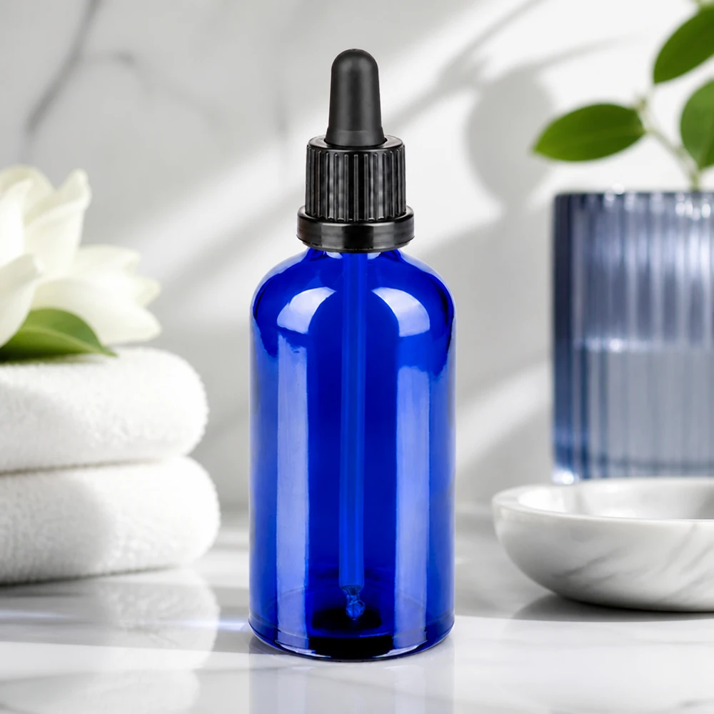 100 ml pipetteflaske sort OV BlueLine UT18/100 Elegant blå glasflaske 100 ml med sort pipette til stilfuld produktpræsentation