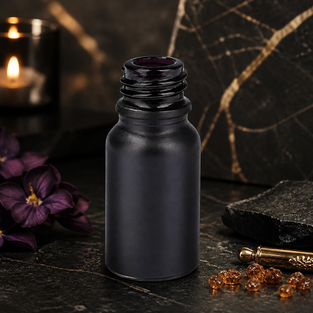 10 ml apoteksflaske BlackLine UT18/10 UNiTWIST 10 ml apoteksflaske BlackLine UT18/10 UNiTWIST fremstillet af violet glas af høj kvalitet til UV-beskyttelse