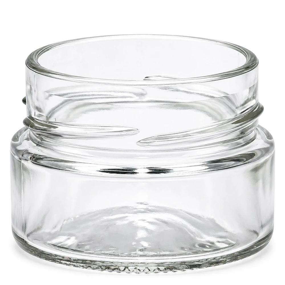 UNiTWIST Runda80 - Rund krukke med en kapacitet på 80 ml TO58deep UNiTWIST Runda80 rund krukke 80ml TO58deep transparent tom skruekrukke uden låg på hvid baggrund