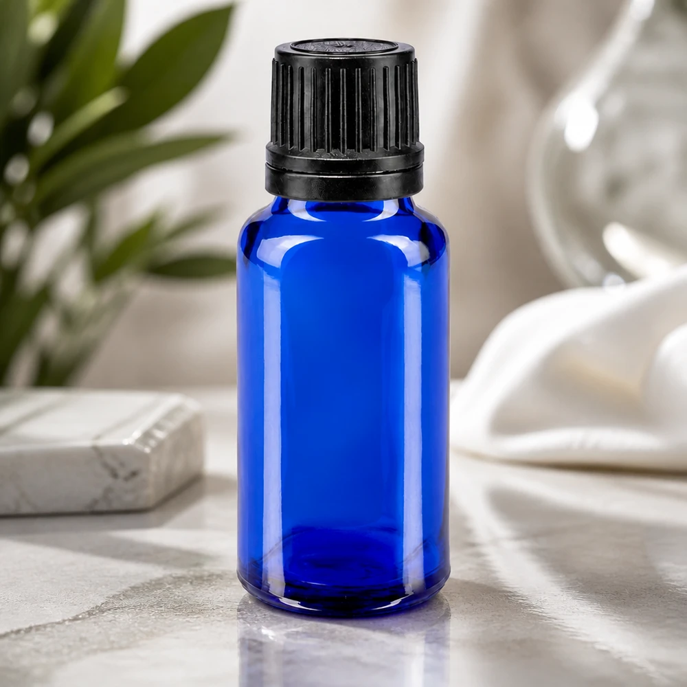 Koboltblå 20 ml apotekerflaske med børnesikret sort originalitetslukning