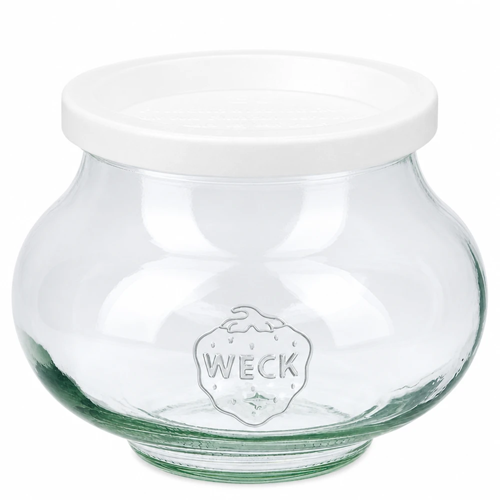 560 ml dekorativt glas med friskhedslåg WECK RR80 WECK dekorativ krukke 560 ml med hvidt friskhedslåg RR80 lavet af klart glas præget med WECK-logo