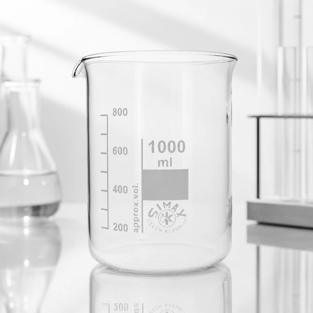 Bægerglas 1000 ml borosilikatglas, lav form Gennemsigtigt bægerglas 1000 ml med hældetud og volumenmarkeringer til præcise målinger