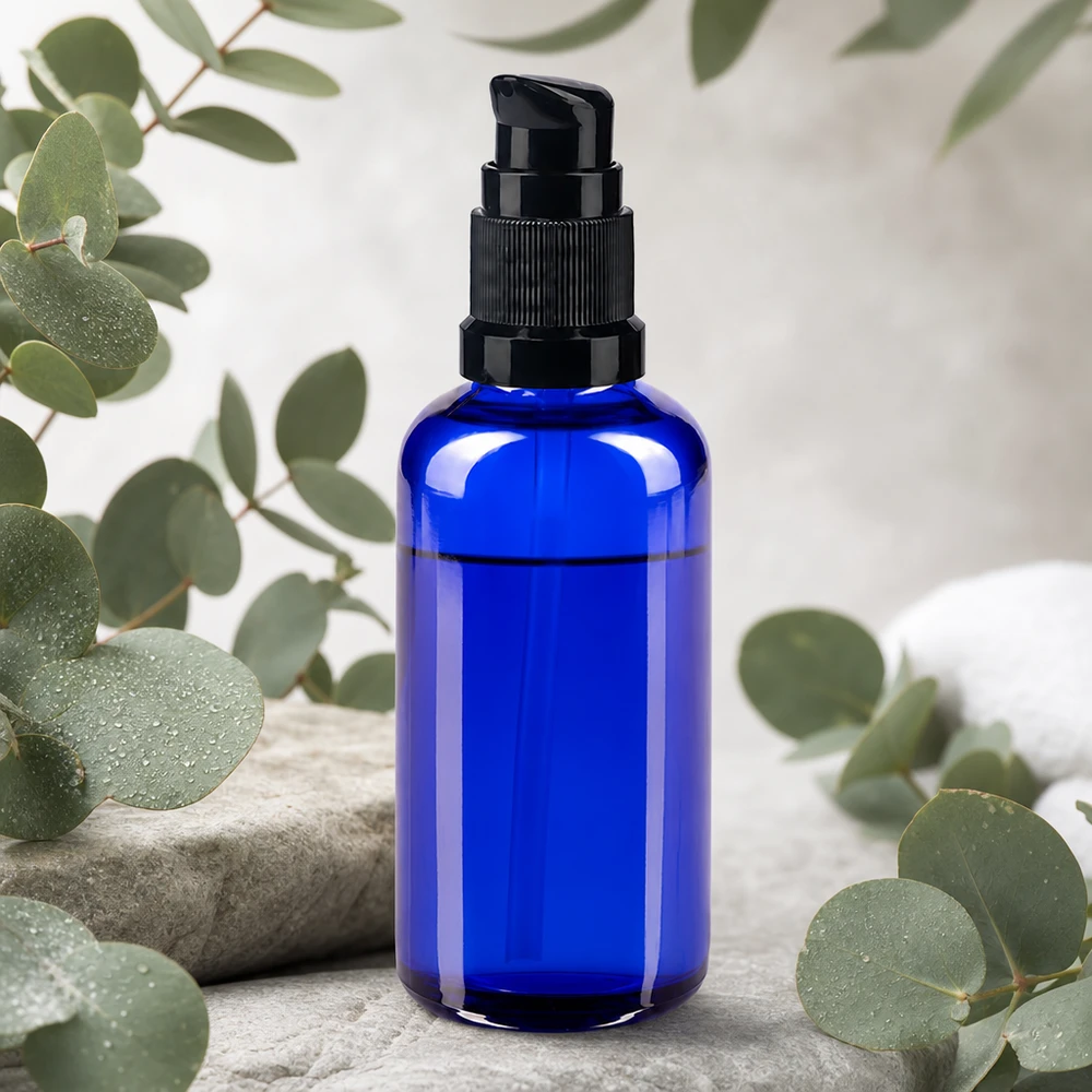Koboltblå 50 ml glasflaske med sort doseringshoved – ideel til serum og olier