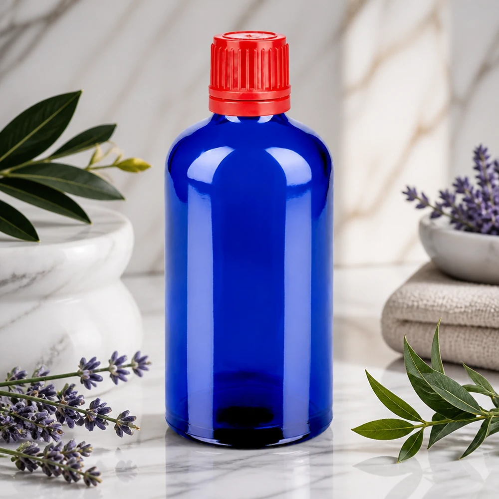 Blå glasflaske 100 ml BlueLine UT18 med tamper evident-lukning til sikker produktopbevaring