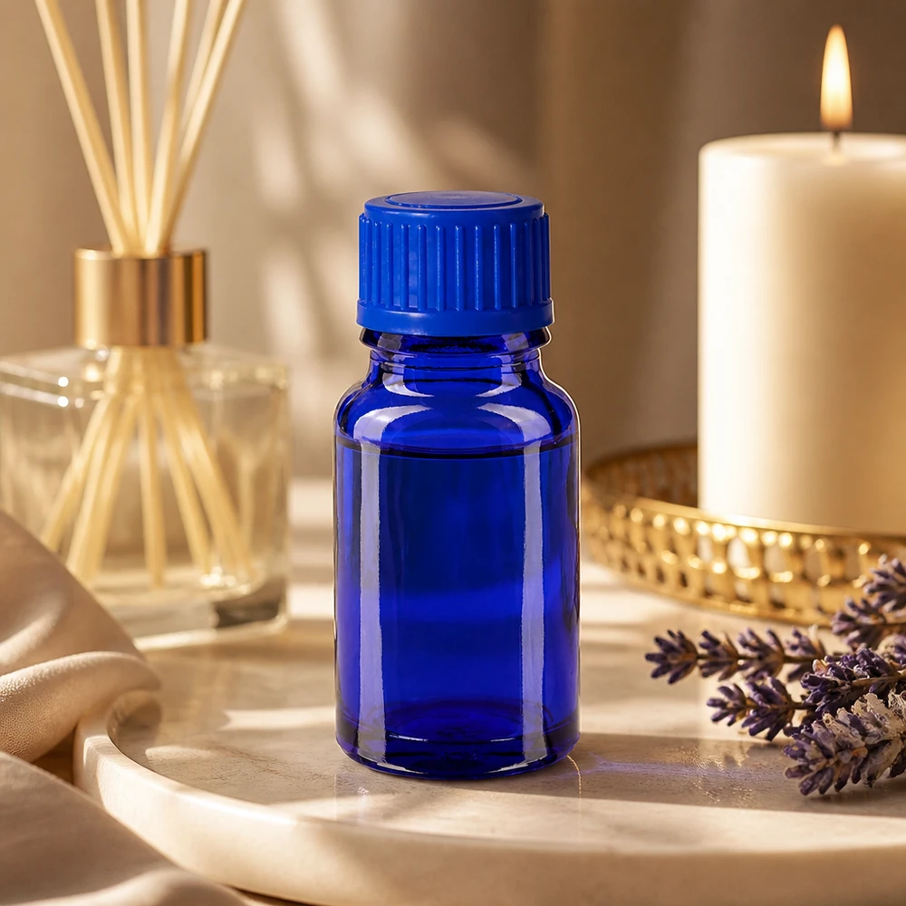 Kompakt 10 ml glasflaske i elegant blå til aromaterapi og wellness
