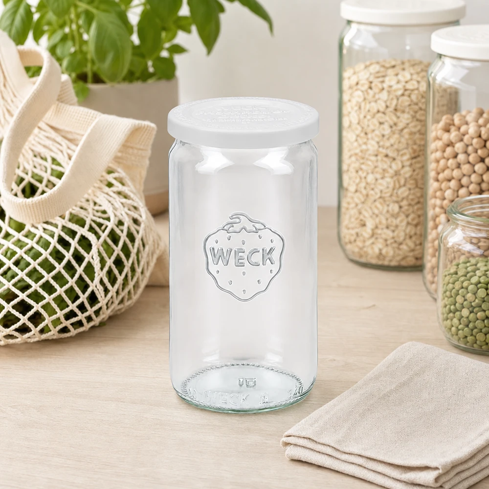 WECK cylinderkrukke 340 ml tom med RR60 friskhedslåg i skandinavisk køkken mellem opbevaringskrukker og netpose