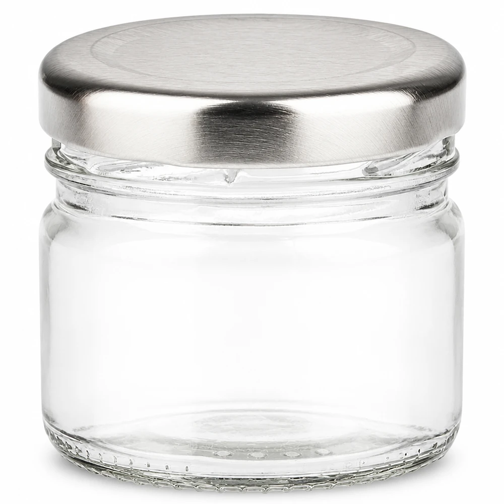 33 ml rund glasbeholder + BasicSeal-låg, sølvfarvet, UNiTWIST Lille rund glasbeholder på 33 ml med sølvfarvet BasicSeal-låg, tom og gennemsigtig set forfra