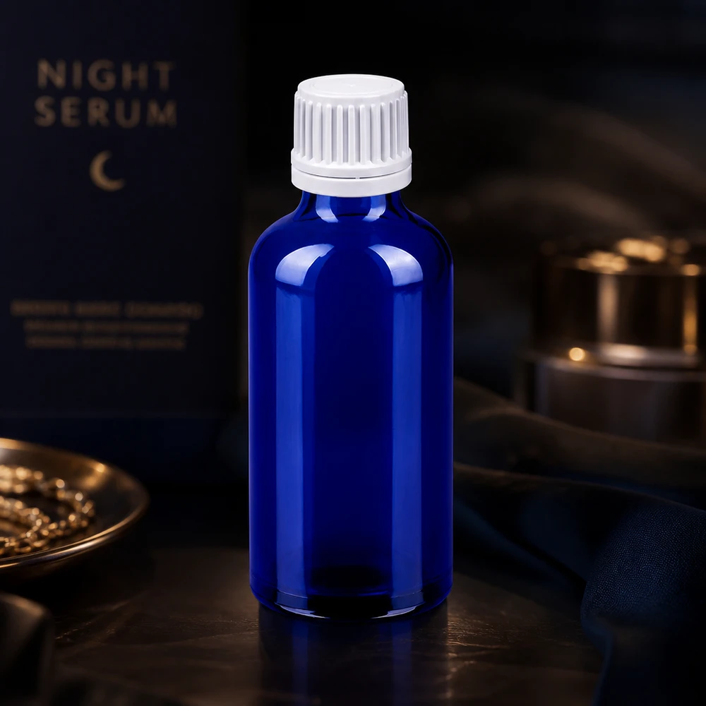 50 ml flaske 11 mm SV hvid OV BlueLine UT18/50 Elegant blå glasflaske 50 ml med hvid dråbehætte til præcis dosering af væsker