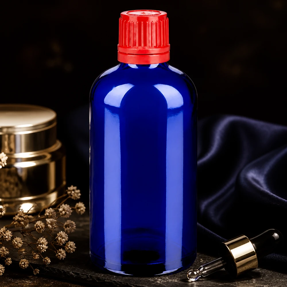 100 ml flaske 11 mm SV rød OV BlueLine UT18/100 Elegant 100 ml BlueLine UT18-dråbeflaske af koboltglas med rød sikkerhedsgodkendt hætte