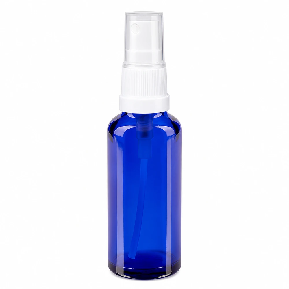 Apoteksflaske blå 30 ml spraytop hvid 30 ml sprayflaske af blåt apotekerglas med hvidt pumpesprøjtehoved og gennemsigtig beskyttelseskappe