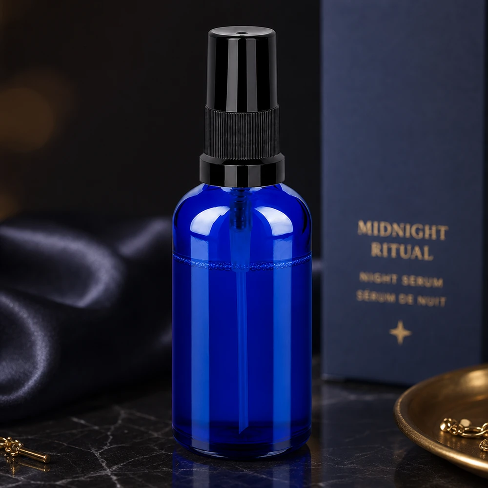Premium 50 ml glassprayflaske i koboltblå med professionelt spraysystem til hudpleje