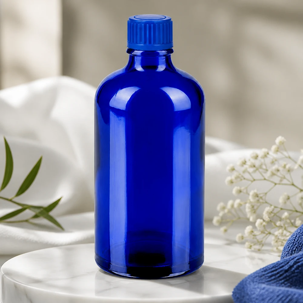 Elegant 100 ml glasflaske i dybblå med ergonomisk design til professionel brug