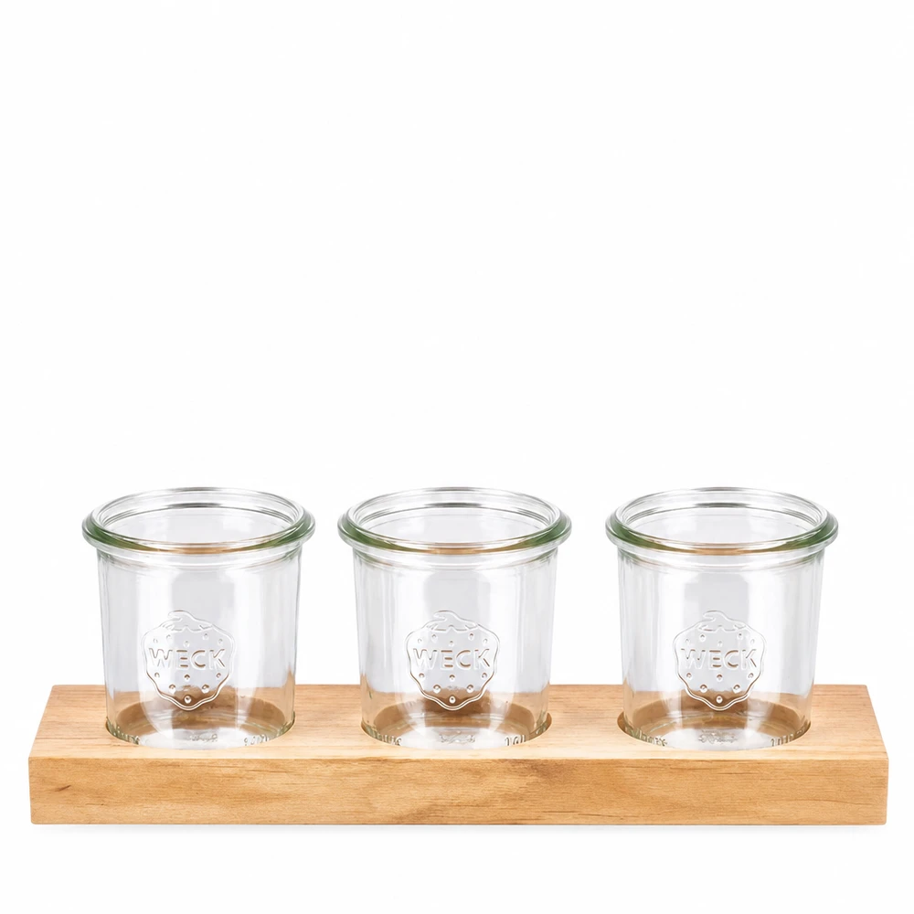 Serveringsbræt Plano3 med 3 Weck-glas med skruelåg, 140 ml Plano3 serveringsbræt i træ med 3 WECK 140 ml-bægre til køkken og opbevaring