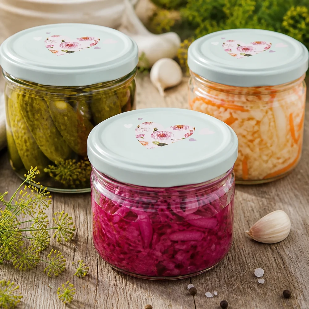 225 ml skålglas + BasicSeal låg hjerte mint UNiTWIST 225 ml BasicSeal mint-hjertelågskrukke med syltede agurker, surkål og gulerødder til fermenterede fødevarer