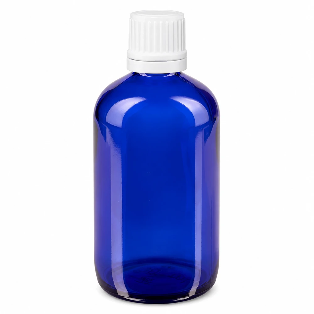 100 ml blå apotekerflaske af glas med hvid originalitetslukning og 0,7 mm dråbeindsats
